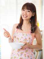 Asian woman enjoy baking