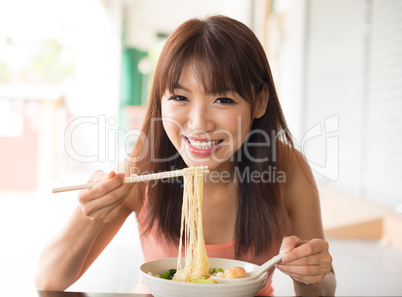 Eating noodles