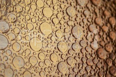 Glass water droplets in gold