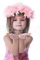 Beautiful little girl in wreath of pink flowers