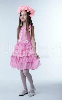 Little girl in beautiful pink dress