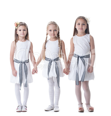 Little girls in white dresses