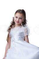 Pretty small kid portrait in white dress isolated