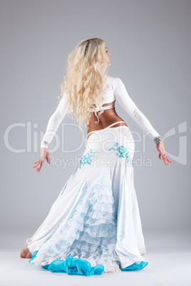 Pretty woman dance in white oriental costume