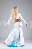 Pretty woman dance in white oriental costume