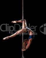 Woman show high gymnastic level during pole dance