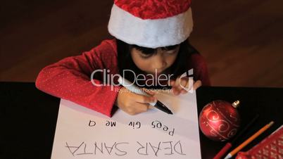 Happy Six Year Old Girl Writing Santa Claus