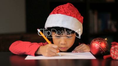 Excited Six Year Old Girl Writing Santa Claus