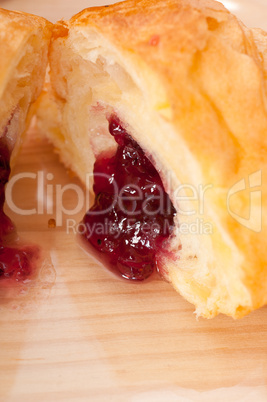 croissant French brioche filled with berries jam