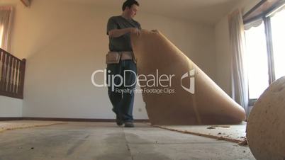 Man Removing Carpet