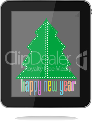 christmas and new year tree on tablet pc