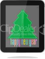christmas and new year tree on tablet pc