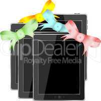 Tablet pc set with ribbons and bow isolated on a white