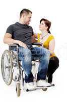 Man in wheelchair and his girlfriend is worried