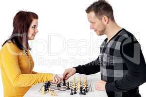 Man and woman playing chess