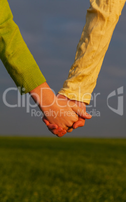 Teen girls holding hands