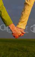 Teen girls holding hands