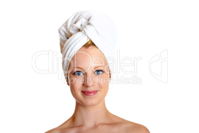 portrait of a beautiful blonde with white towel on her head