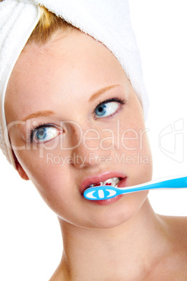 portrait of a beautiful blonde with white towel on her head