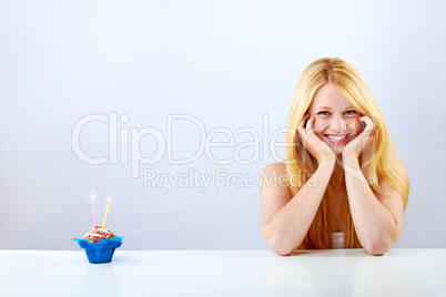 beautiful blonde woman clebrating her birthday
