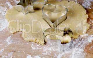 making cookies on wooden desk