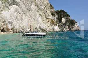 motorboat anchored on beach