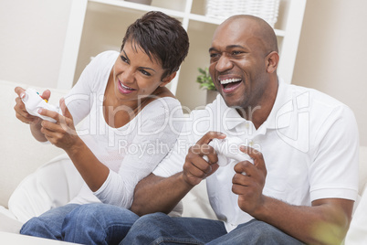 African American Couple Playing Video Console Game