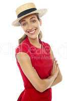 Cheerful baker woman wearing straw bowler hat