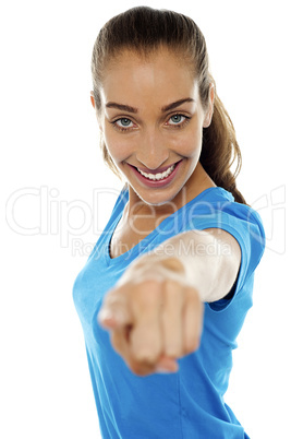 Lady pointing her finger towards the camera