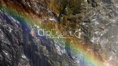 Rainbow in front of a waterfall