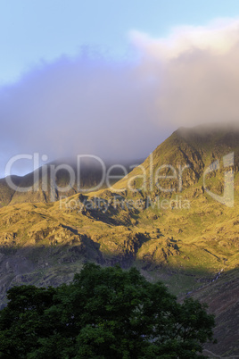 Shaft of sunlight on a mountain range