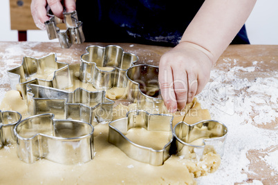 making cookies on wooden desk