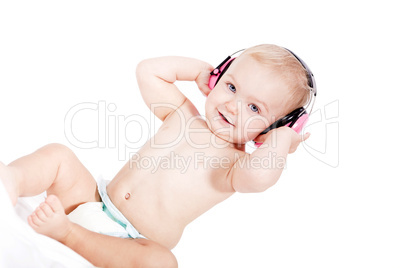 Baby kleinkind mit rosa kopfhörer als Ohrenschutz mit freistell