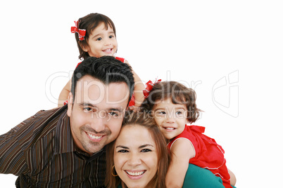 Beautiful family enjoying, mom and dad playing with their daught