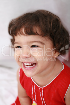 beautiful little girl isolated on a white background