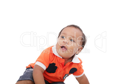 Closeup of happy one year old hispanic baby boy on isolated back