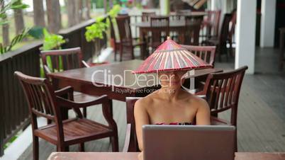 Asian woman at cafe