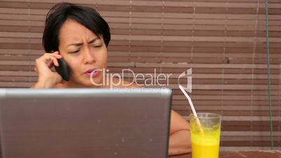 Freelancer woman working at cafe