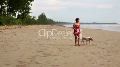 Asian woman exercise her dog