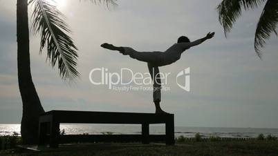 silhouette yoga meditation at beach