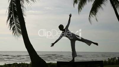 silhouette yoga meditation at beach