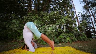 doing handstand yoga mediatation exercise