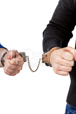 Men and women connected with handcuffs