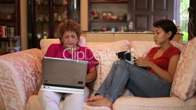 Mother daughter using tablet computer