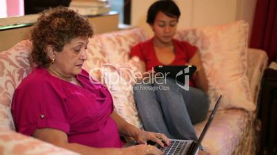 Mother daughter using tablet computer