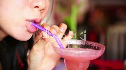 Asian young woman drink cocktail