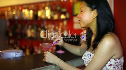 Asian young woman drink cocktail