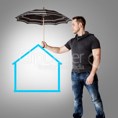 Man holding umbrella over symbolic home