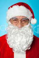 Snapshot of smiling senior man in Santa attire