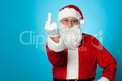 Agitated Santa showing his middle finger